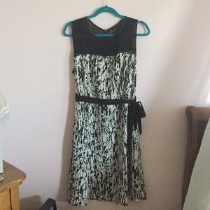 Black and white patterned dress with bow on side